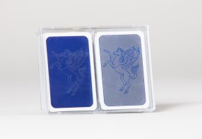 blue and silver playing card, in Perspex box,s with heraldic Pegasus emblem in reverse colour