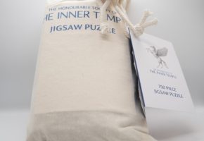 A canvas bag containing the jigsaw