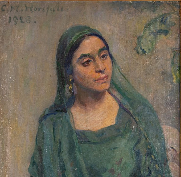 Framed oil portrait painting of a seated figure wearing a flowing green robe and matching head covering. The figure sits in an armchair with hands folded in their lap, facing slightly to the left. Loose, painterly brushstrokes in muted greens, greys, and beige tones create a soft background. An inscription in the upper-left corner reads “C. W. Horsfall 1923.”.