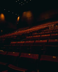 Darkly lit red theatre seats