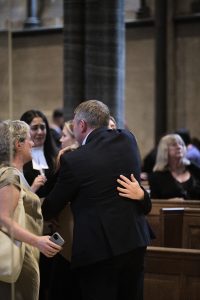 A proud relative hugs his Callee in Temple Church