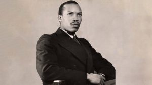 Sir Seretse Khama by Bassano Ltd Image Source: https://www.npg.org.uk/collections/search/portrait/mw61557/