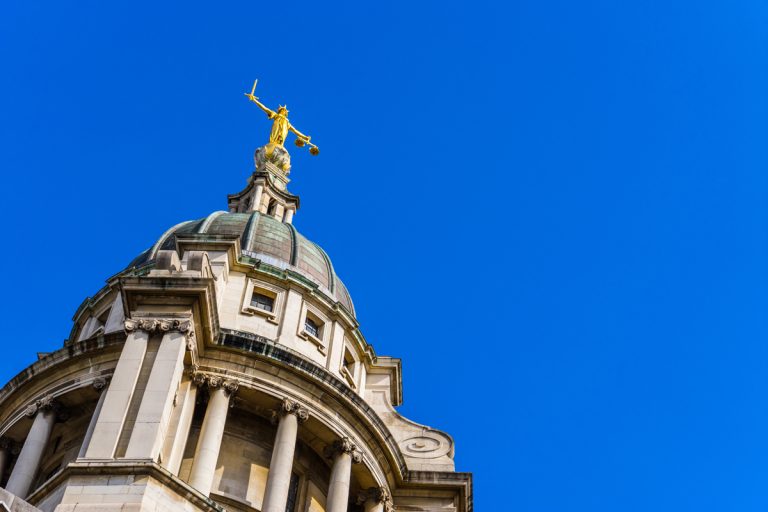 Royal Courts of Justice with Lady Justice