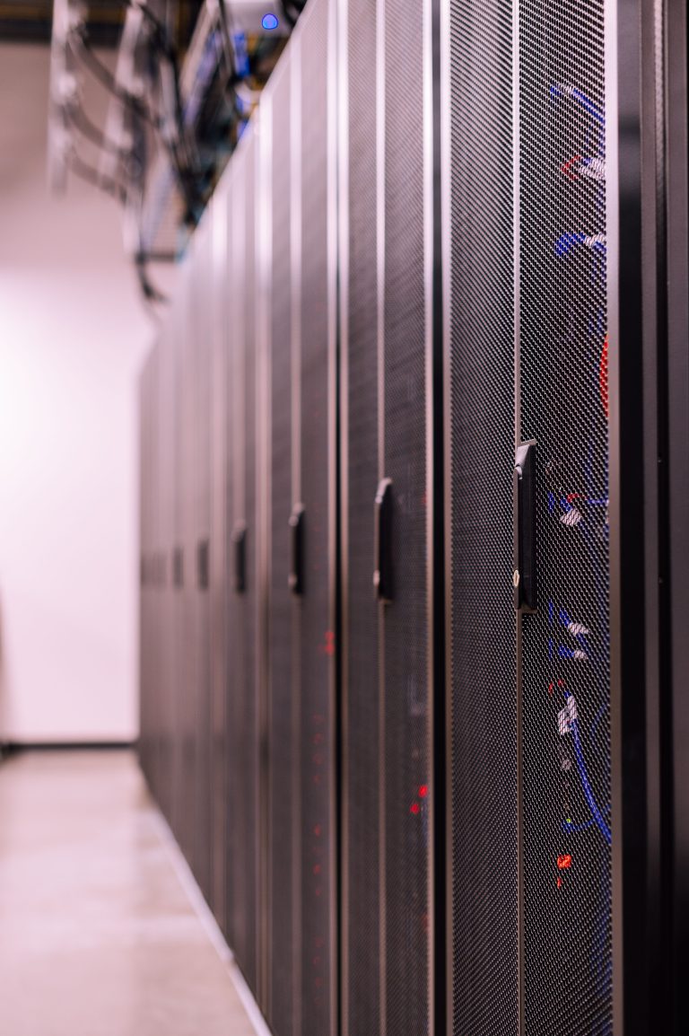 Stock image of server racks in a data center